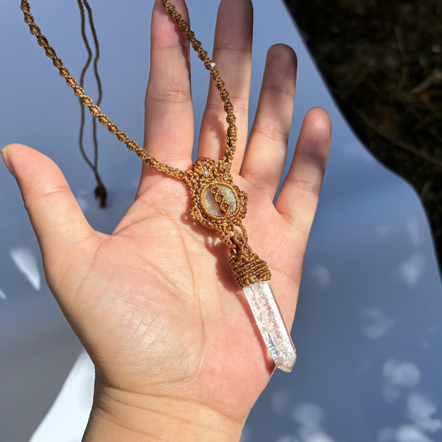 M24115 - Macrame golden lepidorite and lemurian quartz point pendant